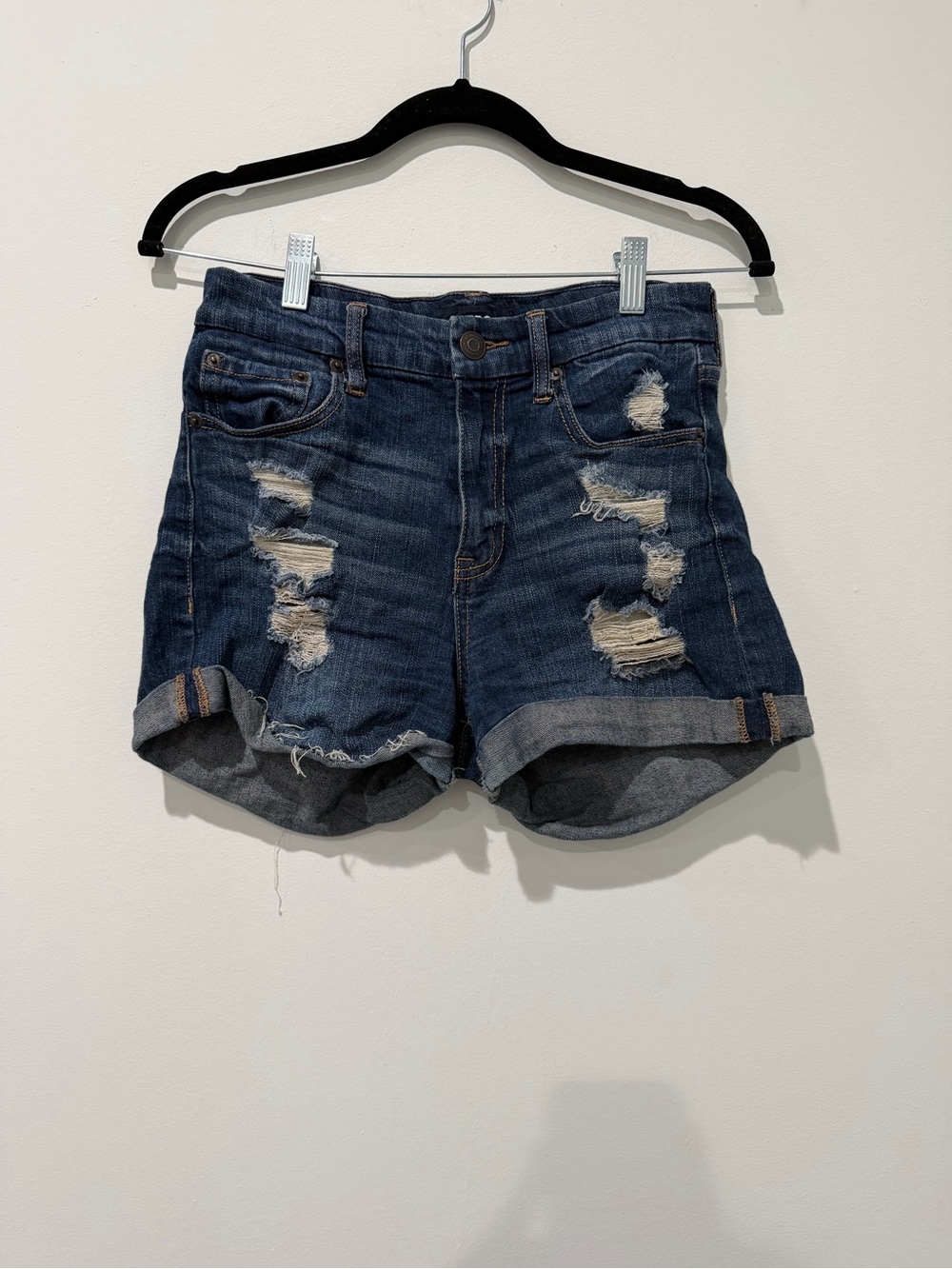 High-Rise Distressed Denim Shorts in Dark Blue